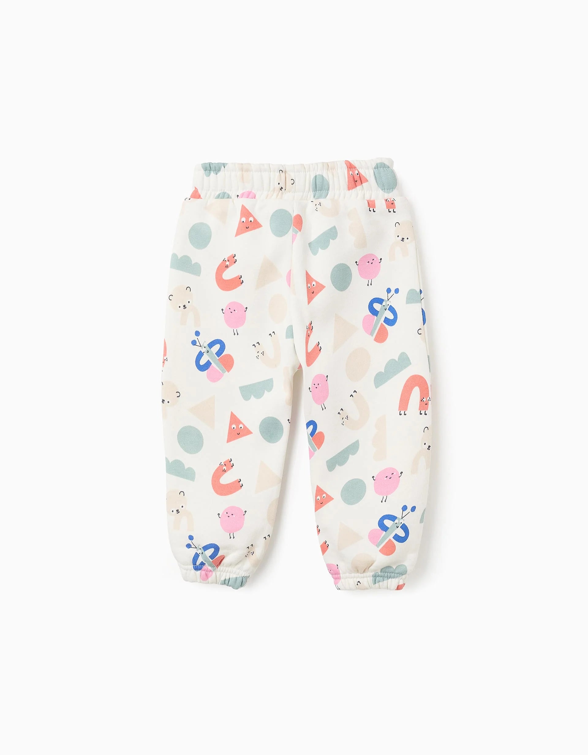 Fluted jogger pants with a 'Shapes' pattern for baby girls, white.